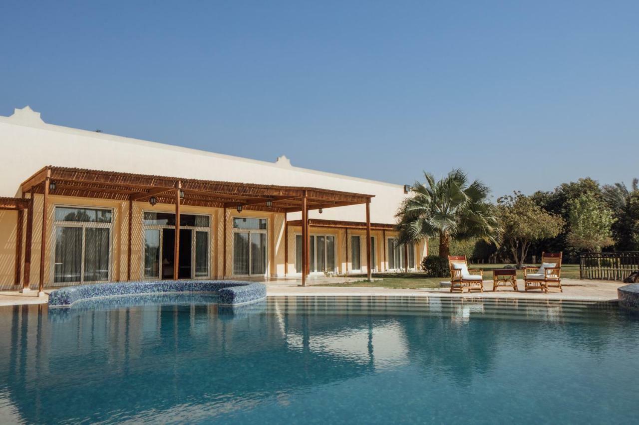 Jolie Ville Hotel & Spa Kings Island Luxor Eksteriør billede The resort's swimming pool